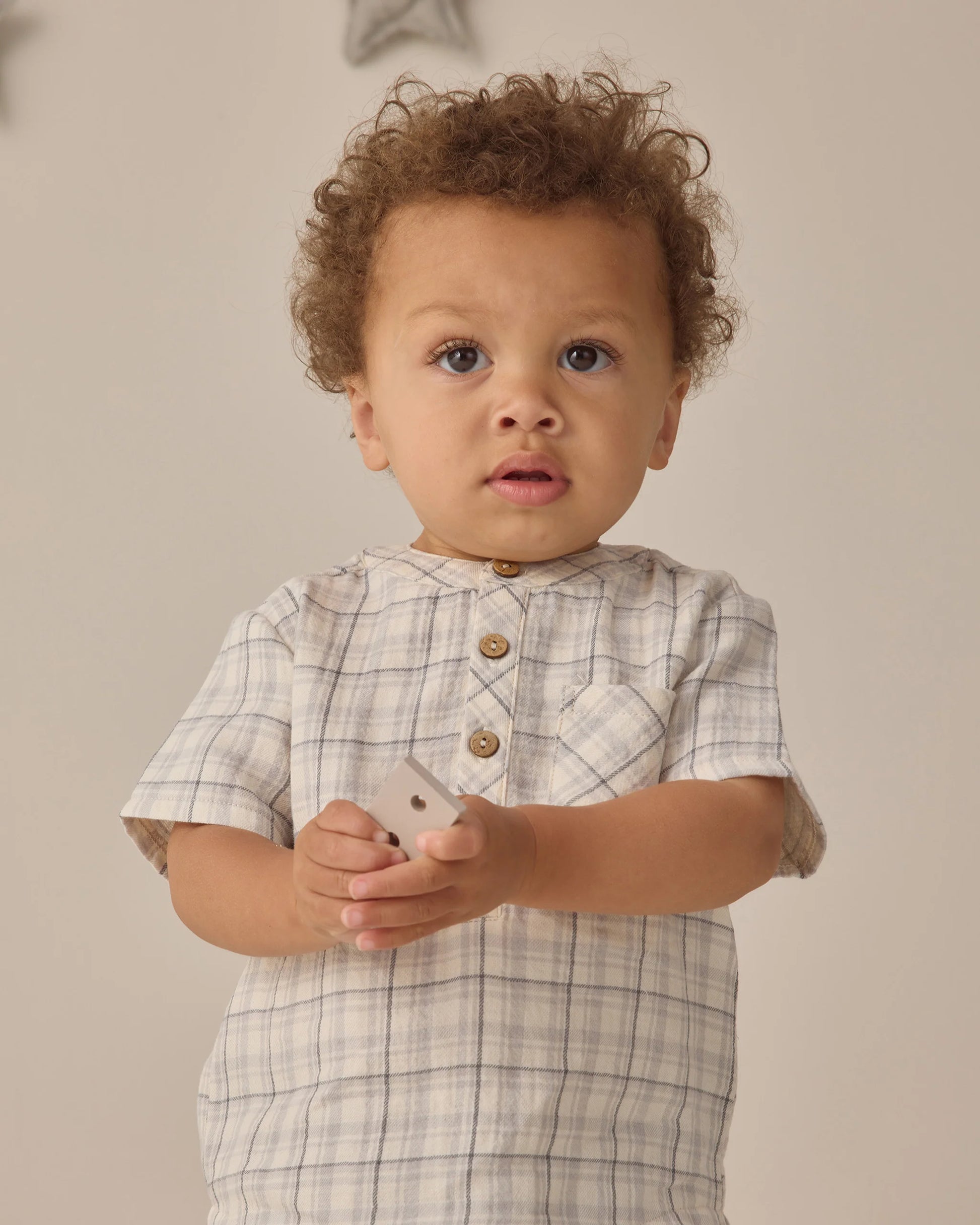 Blue plaid Jaxson shirt by Quincy Mae, shown flat with collar, long sleeves, and button-down front on a white background.