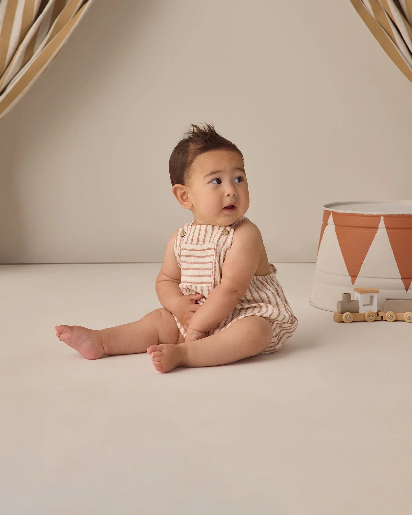 Vintage stripe Hayes romper by Quincy Mae, featuring colorful fabric and comfortable design for babies.