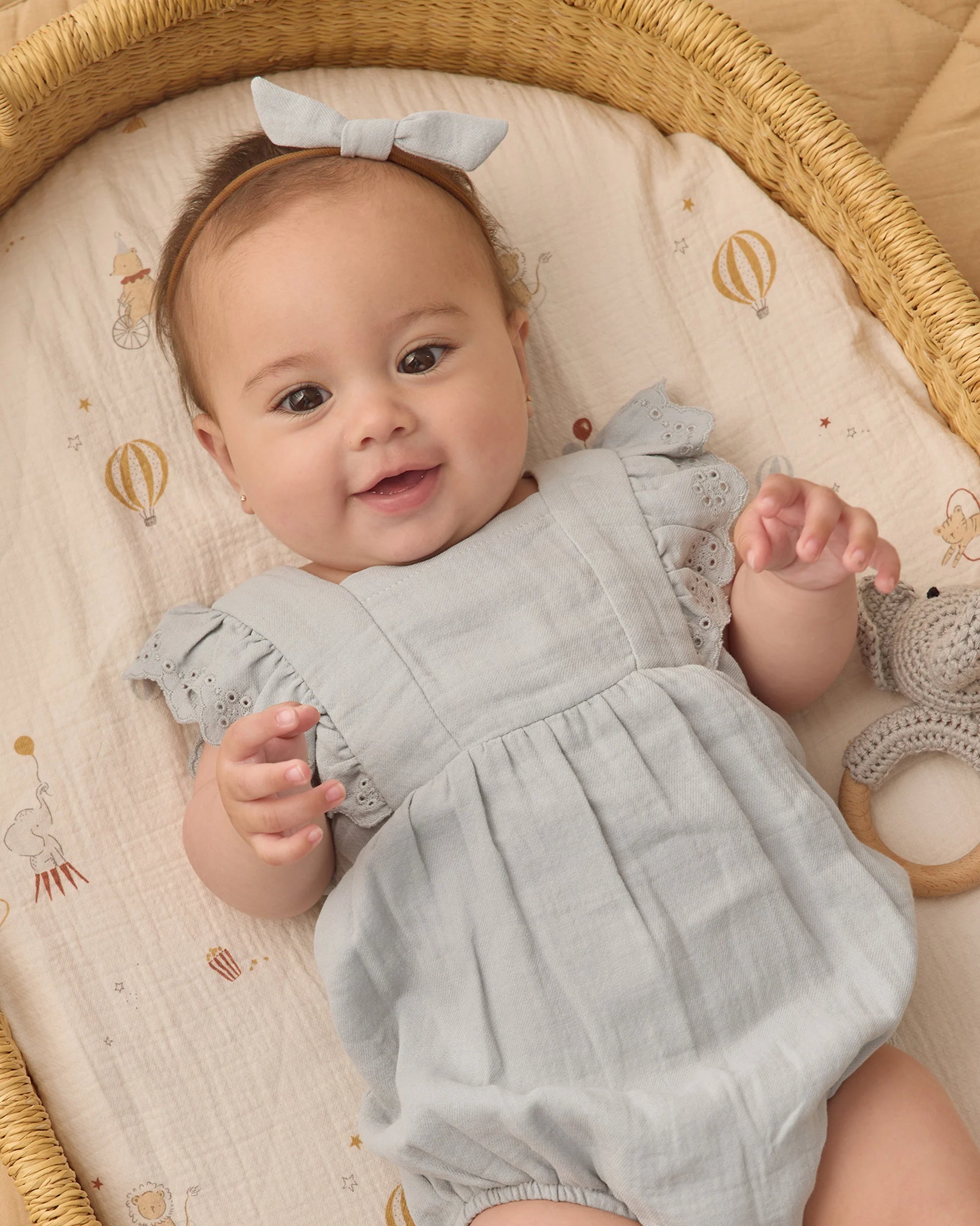 Sky Naomi romper by Quincy Mae, featuring soft fabric and stylish design, shown on a model in a studio setting.