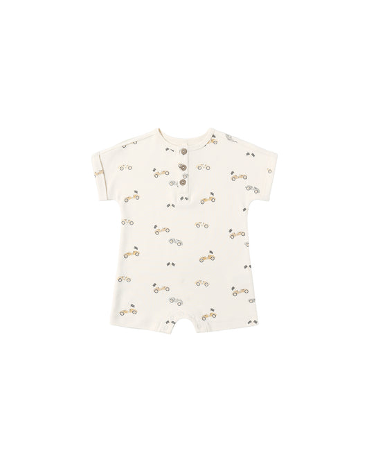 Natural-colored Quincy Mae race car short sleeve one-piece for babies, featuring a playful race car design on soft fabric.