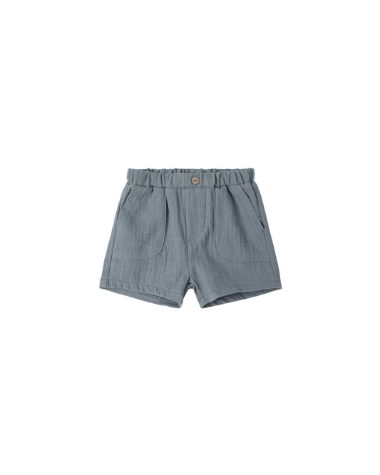 Light blue Quincy Mae Ocean Utility Shorts for toddlers with elastic waistband and soft fabric, ideal for warm weather.