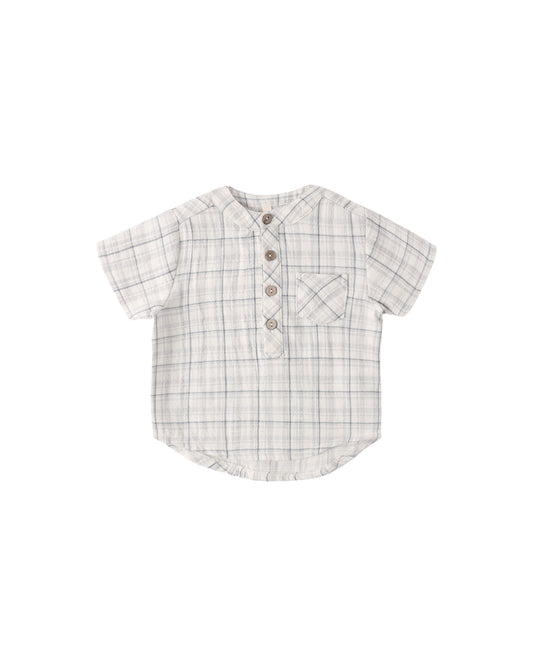 Blue plaid Jaxson shirt by Quincy Mae, featuring a classic pattern and button-up style, displayed on a neutral background.