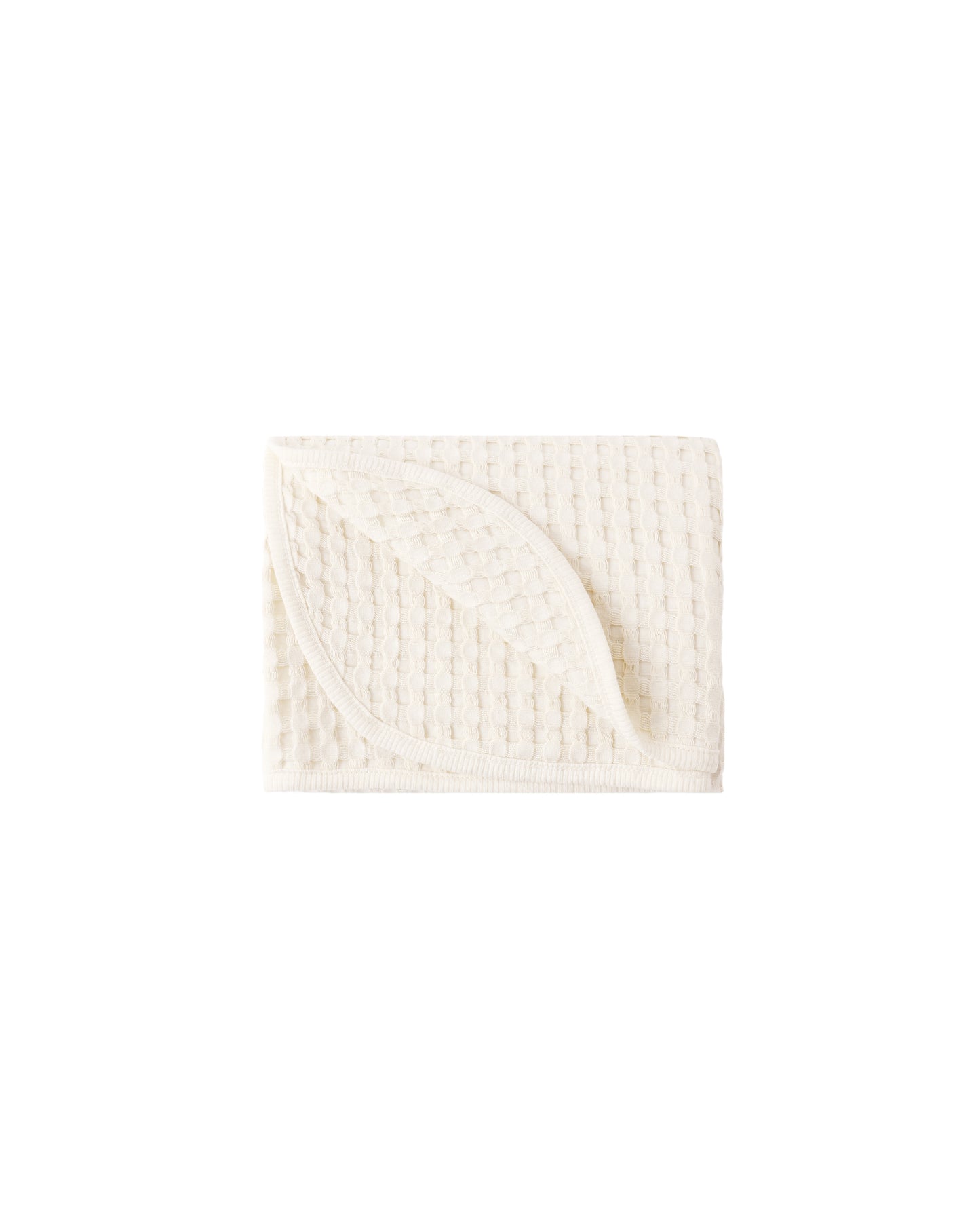 Soft natural waffle baby blanket by Quincy Mae, showing textured fabric and cozy design for infants.