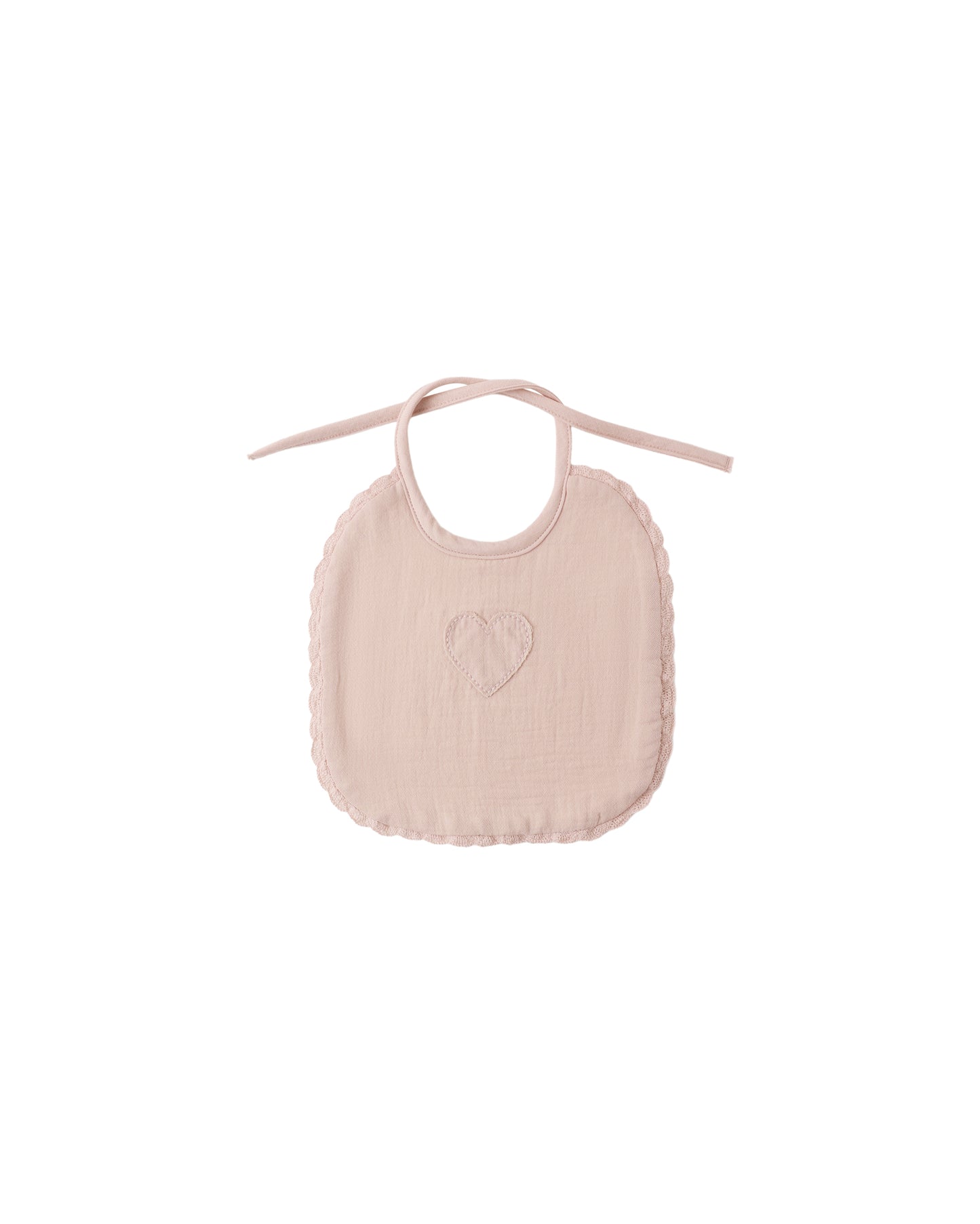 Blush woven tie bib by Quincy Mae featuring soft fabric and adjustable tie closure for infants and toddlers.