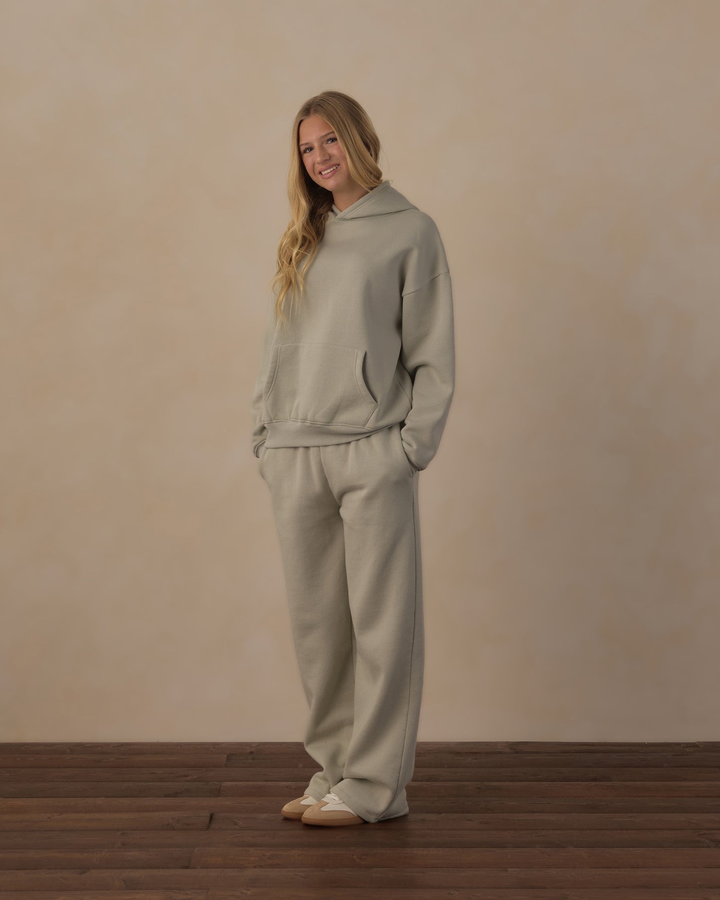 Teen Sage Relaxed Hoodie by Rylee & Cru, showing a cozy, oversized sage green hoodie with a front pocket and hood.