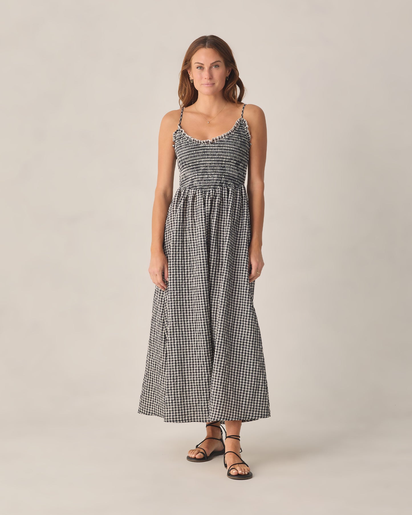 Women's black check Chrissy dress by Rylee & Cru featuring a relaxed fit and stylish pattern, shown on a model.