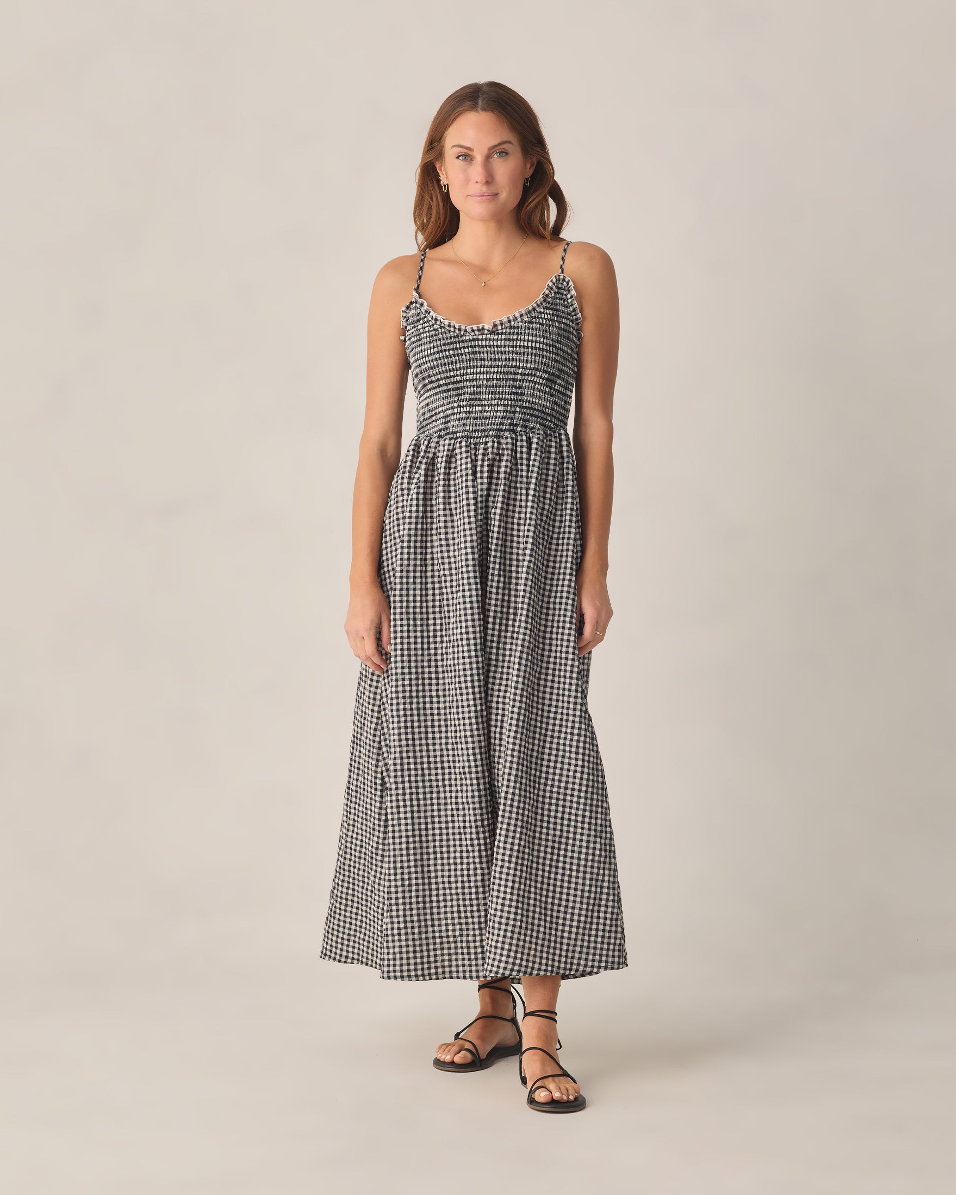 Women's black check Chrissy dress by Rylee & Cru featuring a relaxed fit and stylish pattern, shown on a model.