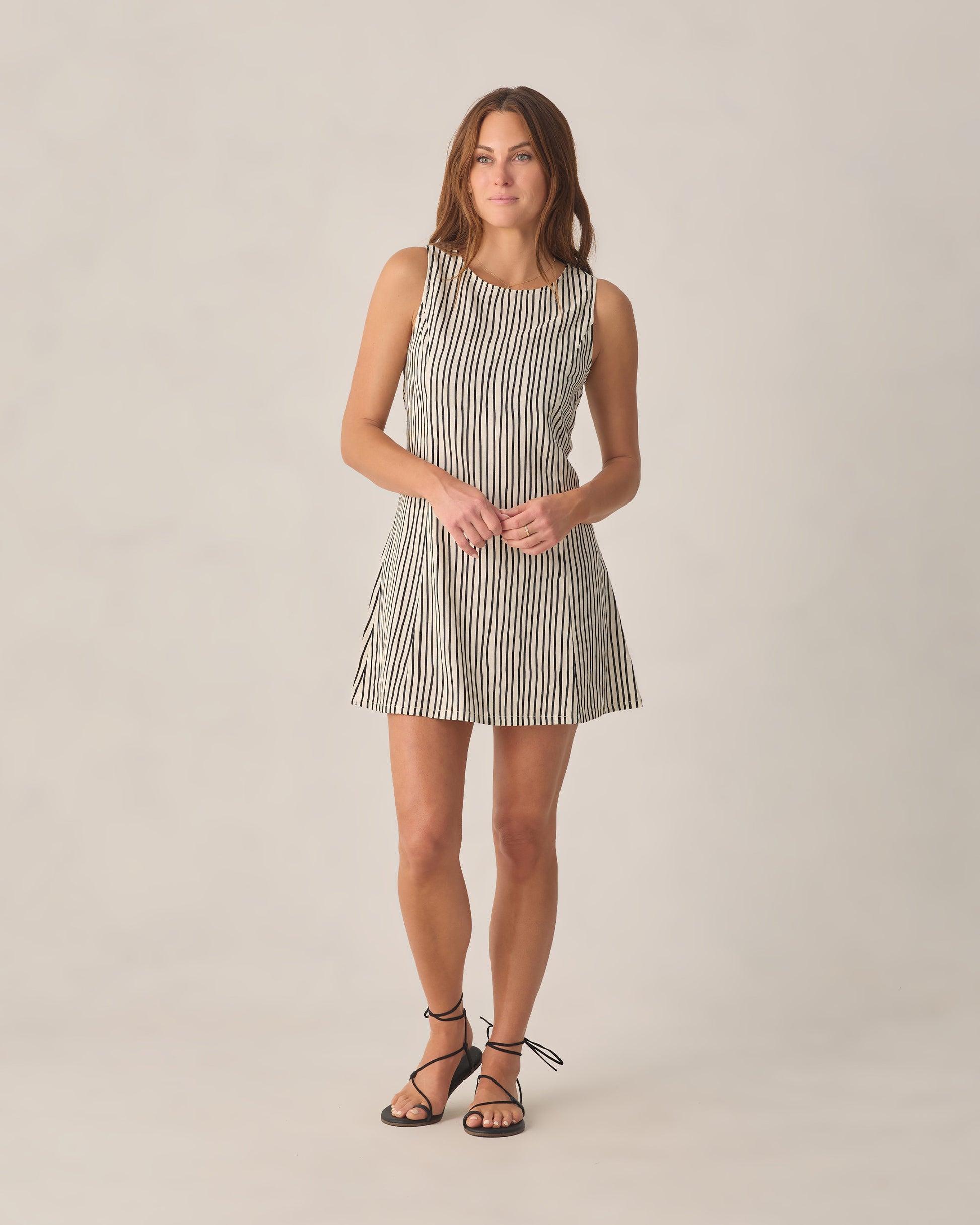Women's wavy striped Indi mini dress by Rylee & Cru featuring a relaxed fit and stylish pattern, displayed on a model.