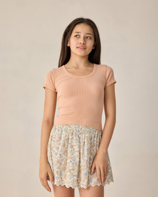 Teen Melon Pointelle Jersey by Rylee & Cru, close-up of soft, pink knit fabric with delicate pointelle pattern.