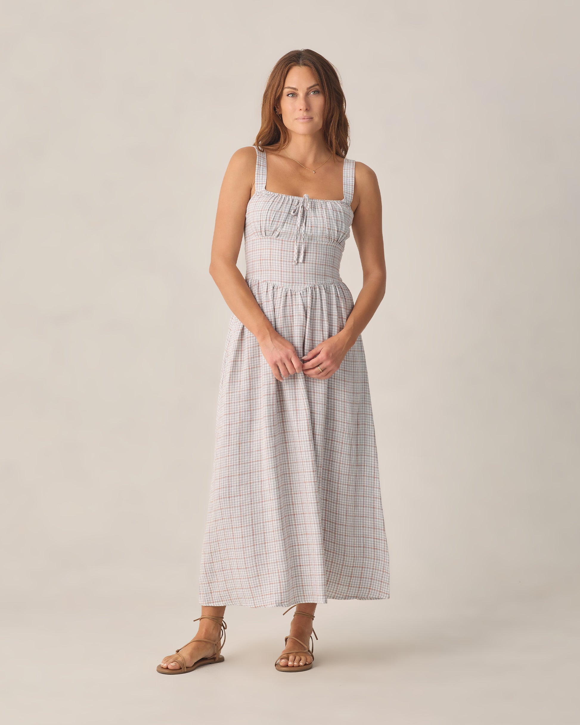 Light blue plaid Primrose maxi dress for women by Rylee & Cru, shown on a model with flowing fabric and a relaxed fit.