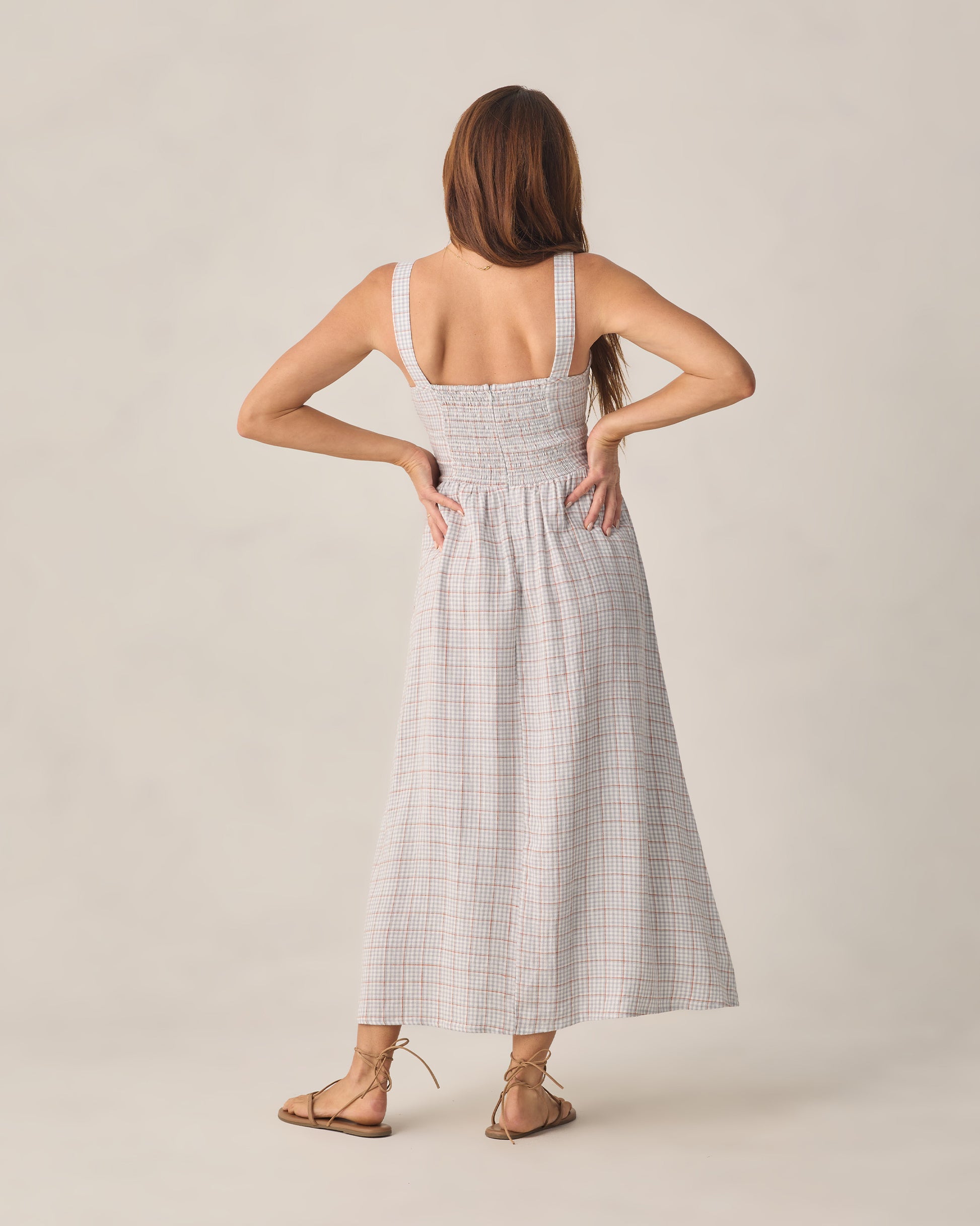 Light blue plaid Primrose maxi dress for women by Rylee & Cru, flowing fabric with a fitted bodice and full-length skirt.
