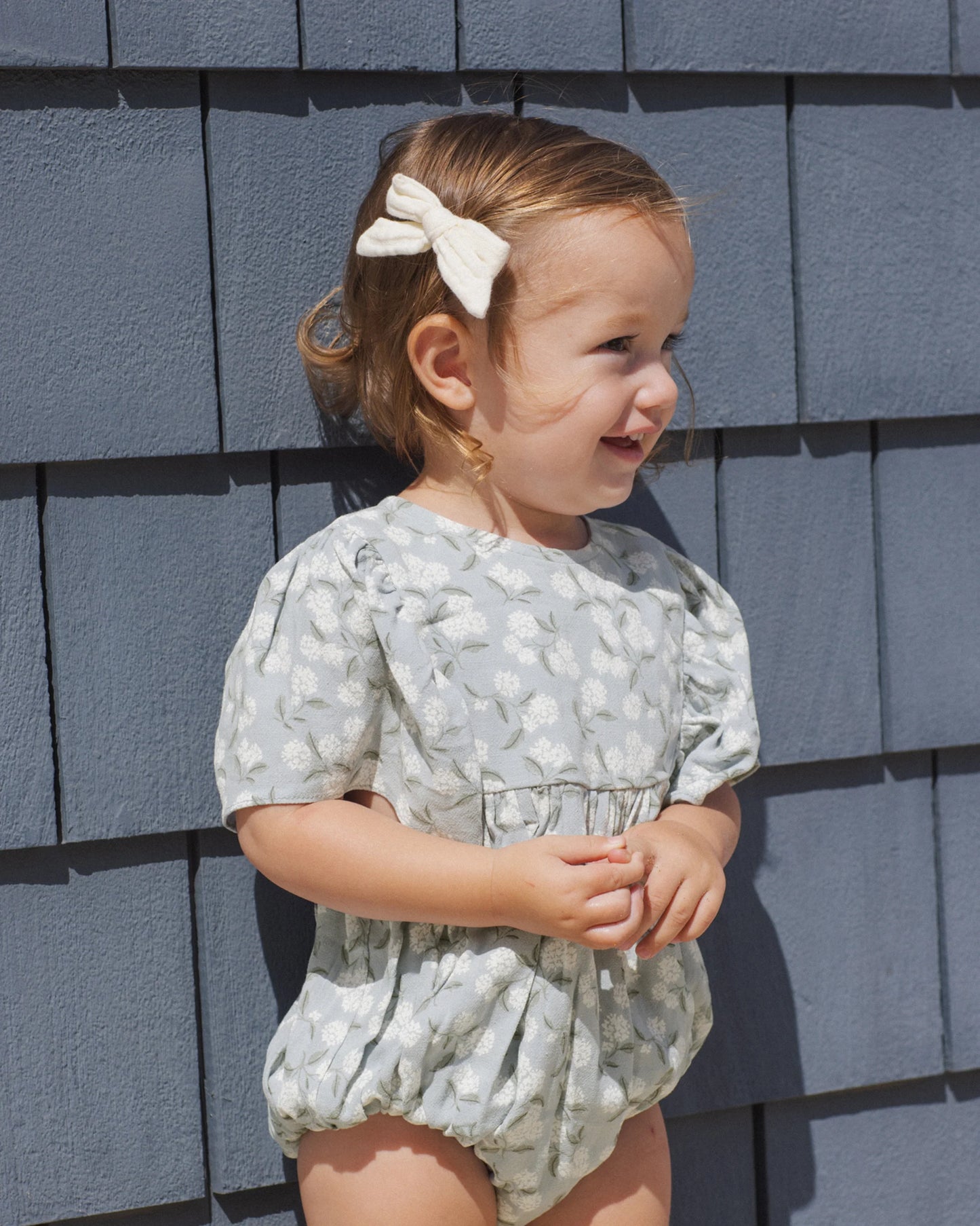 Rylee & Cru Hydrangea Kalea romper in soft fabric, featuring floral hydrangea print and comfortable design for babies.