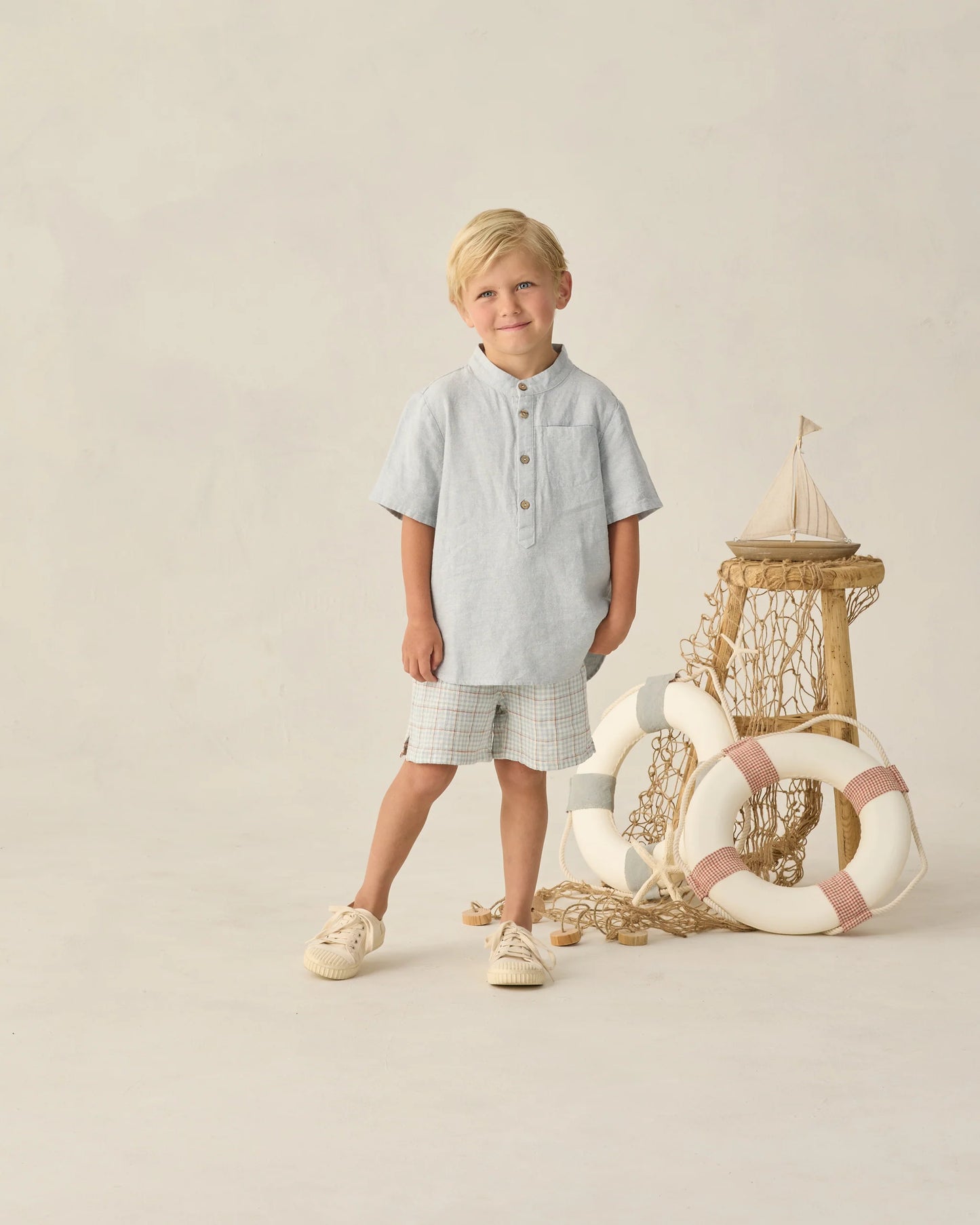 Light blue plaid Perry shorts by Rylee & Cru, featuring a relaxed fit and adjustable waist for comfortable casual wear.