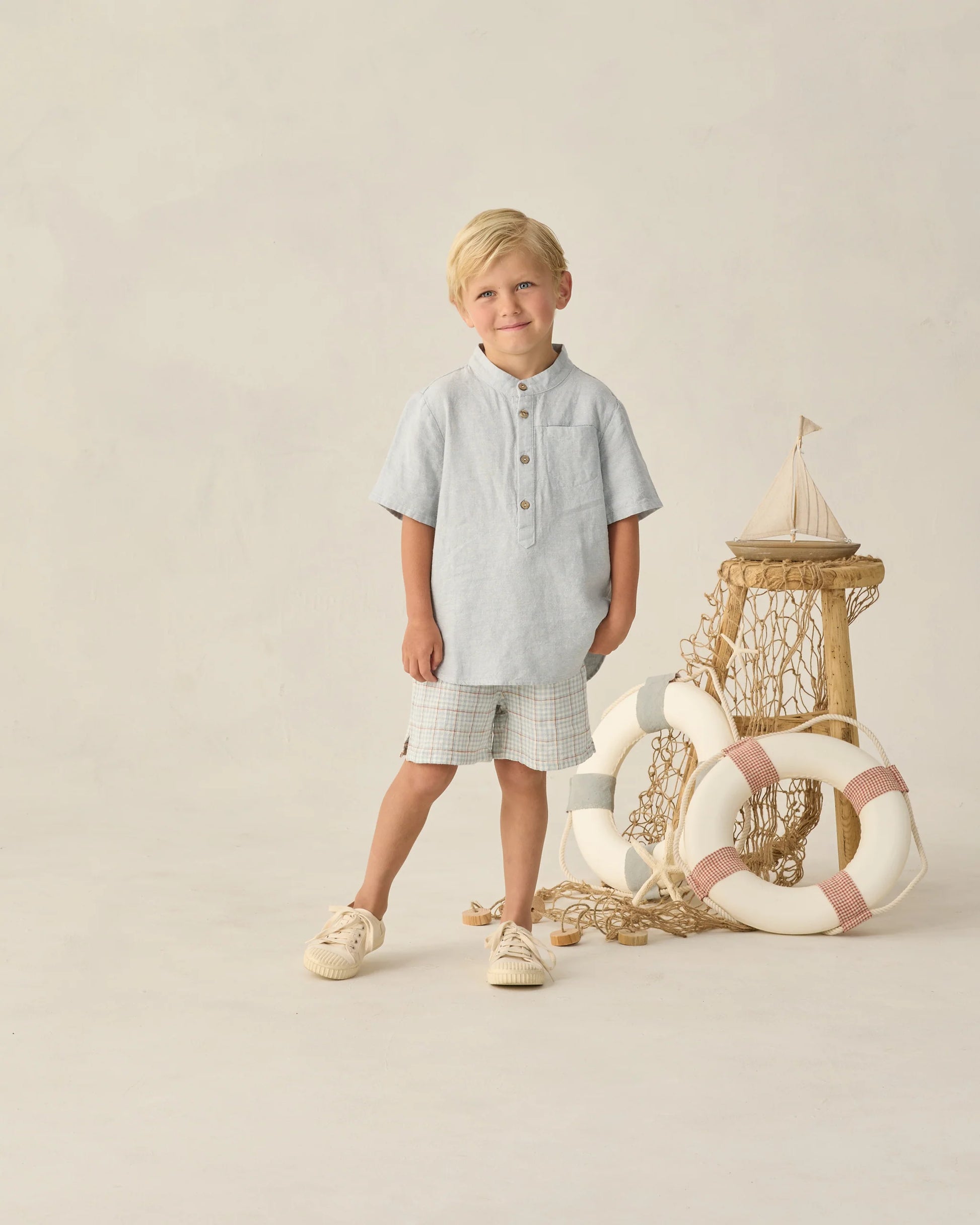 Light blue plaid Perry shorts by Rylee & Cru, featuring a relaxed fit and adjustable waist for comfortable casual wear.