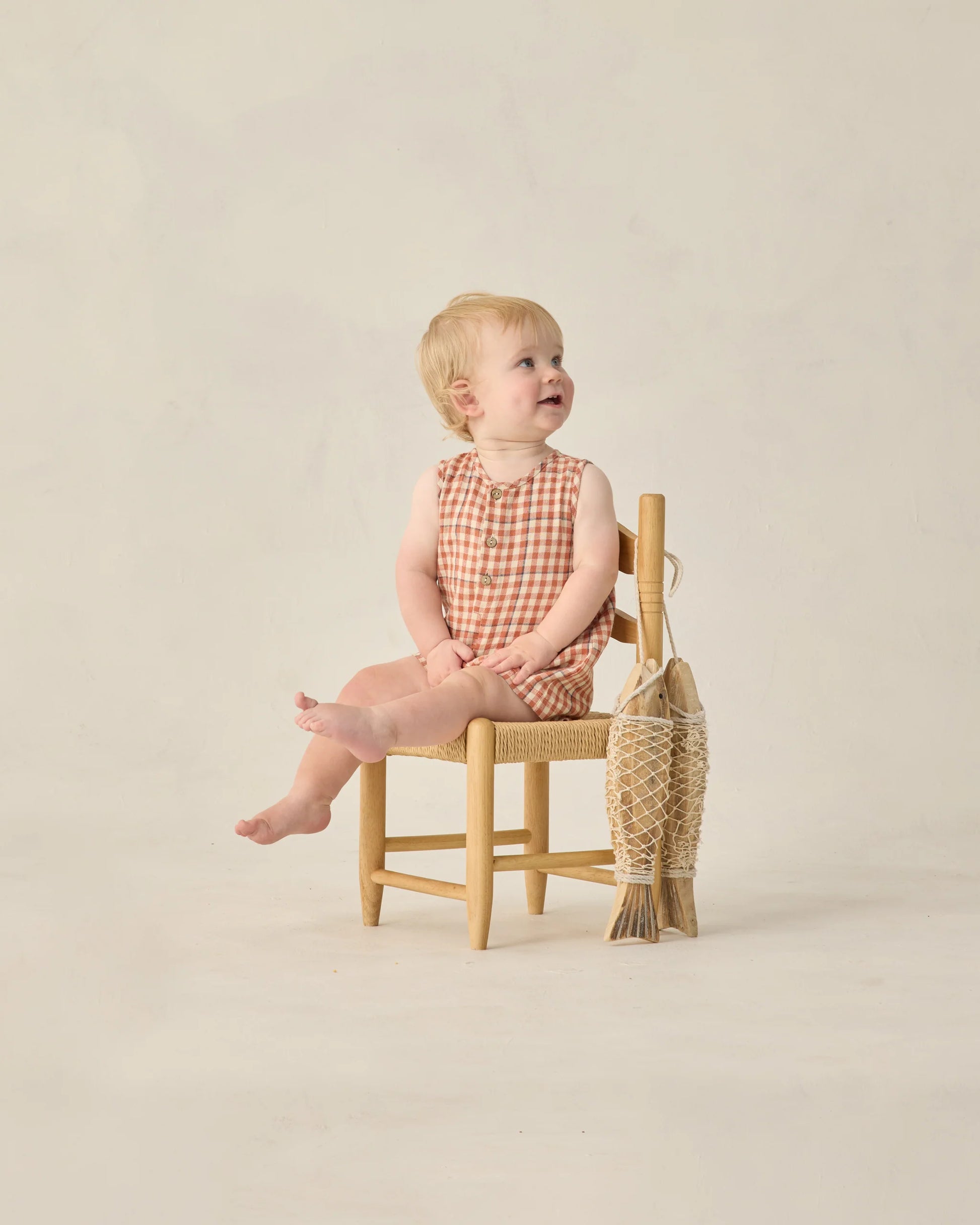 Rylee & Cru Poppy Gingham Mavrick Romper in red and white, featuring a cute sleeveless design and gathered waist detail.