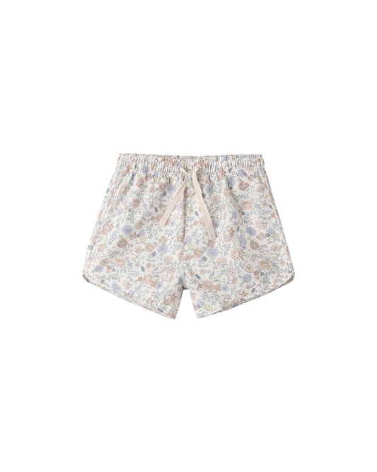 Rylee & Cru Bloom Swim Trunk in ivory with floral pattern, elastic waistband, and quick-dry fabric for kids' swimming and beachwear.