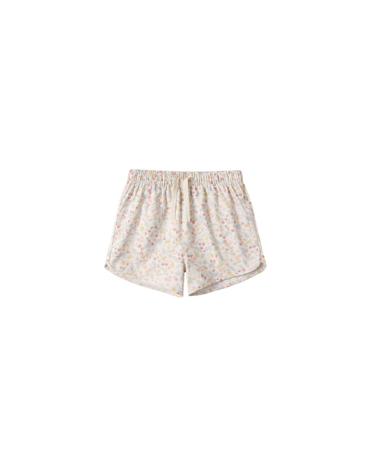 Rylee & Cru summer garden swim trunk in ivory featuring vibrant floral print, perfect for kids' beach and pool outings.
