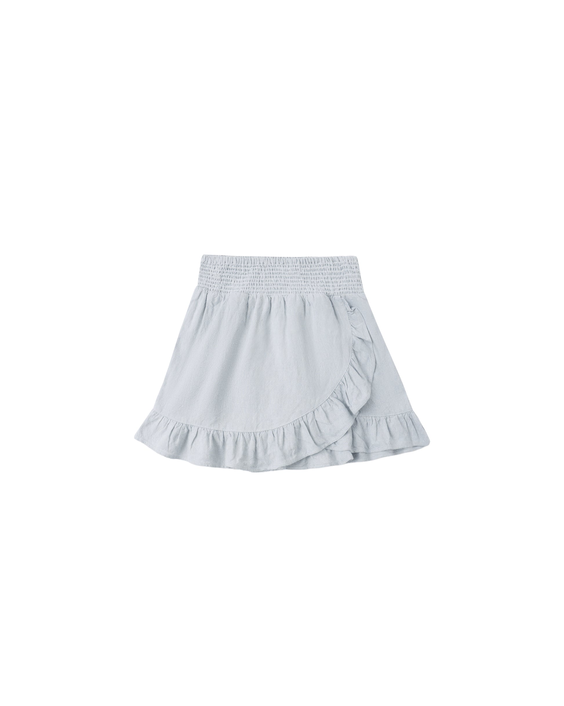 Heathered light blue wrap ruffle skirt from Rylee & Cru, showing soft fabric and feminine ruffle details.