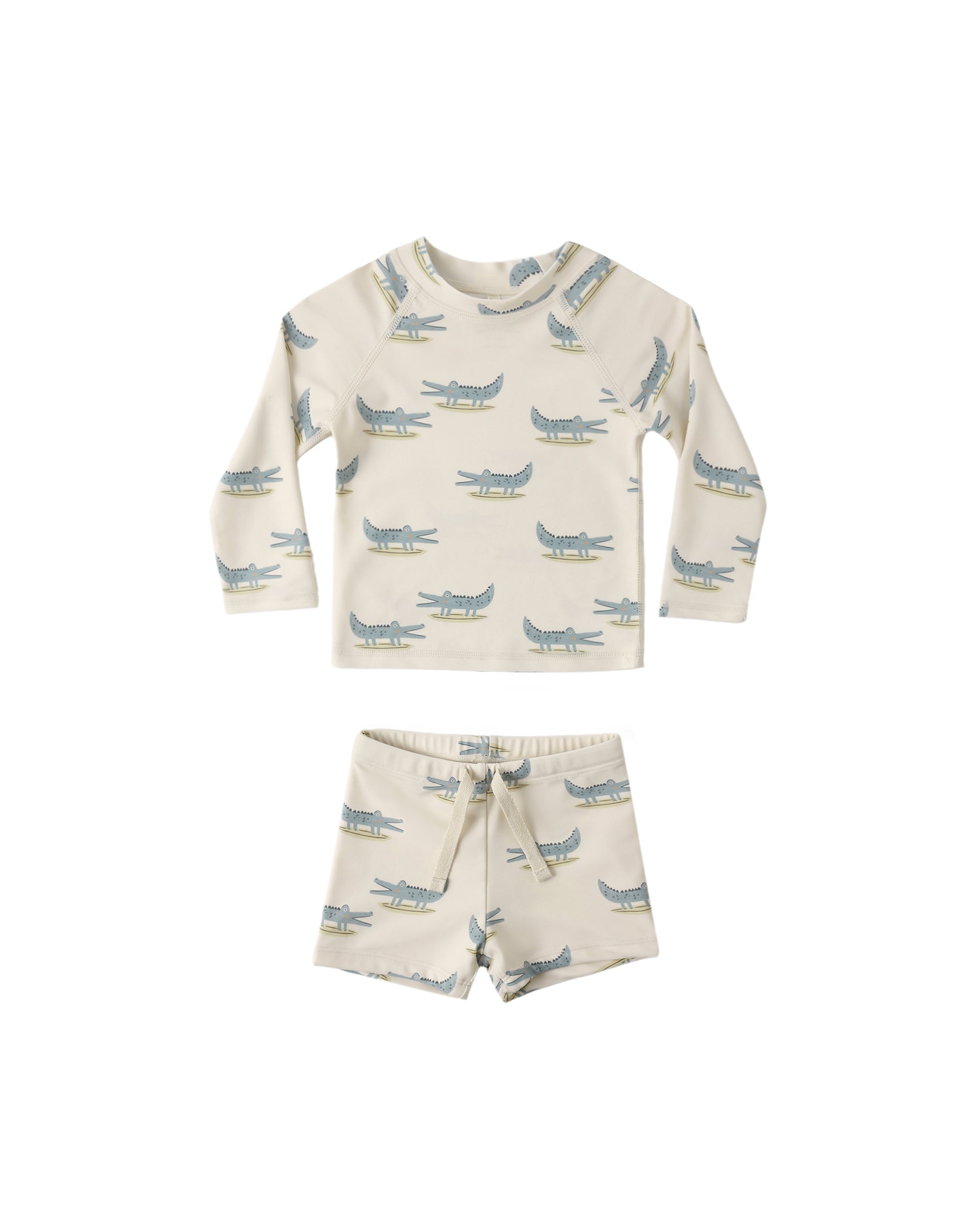 Alligators Boys Rashguard Set by Rylee & Cru, featuring a natural-colored short-sleeve swim shirt with alligator print and matching swim shorts.