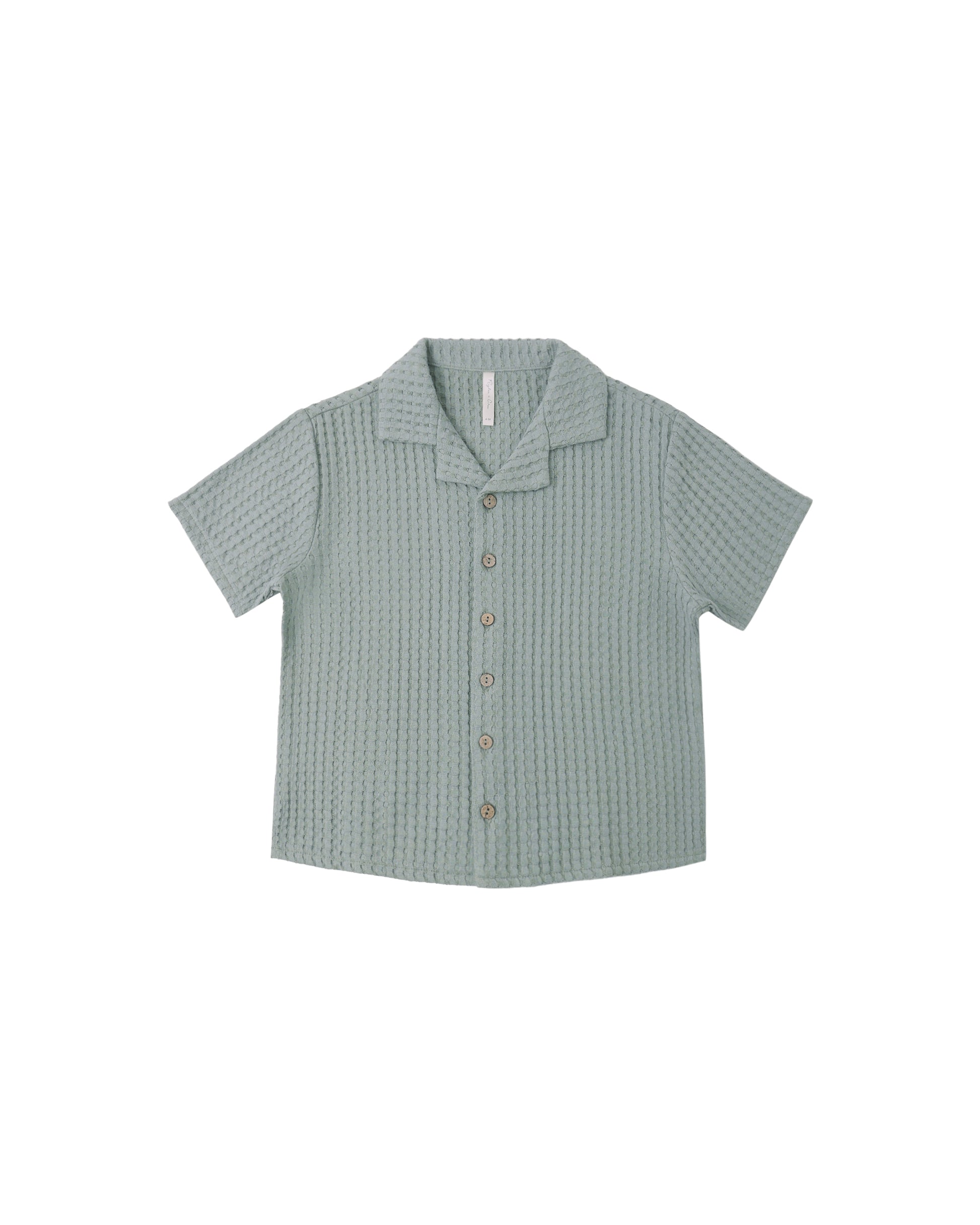 Sea green lapel collar shirt by Rylee & Cru, displayed on a hanger with a close-up of the collar and fabric texture.