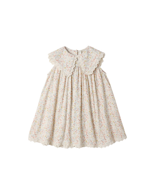Rylee & Cru Summer Garden Porter Dress in ivory, lightweight cotton with floral print, displayed on a hanger.