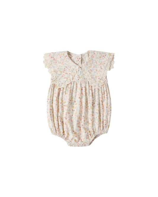 Rylee & Cru Summer Garden Porter Romper for babies, ivory fabric with floral print, short sleeves and snap closures.