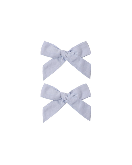 Pair of periwinkle fabric bows for hair, set of 2 by Rylee & Cru, with soft, decorative loops and tails.