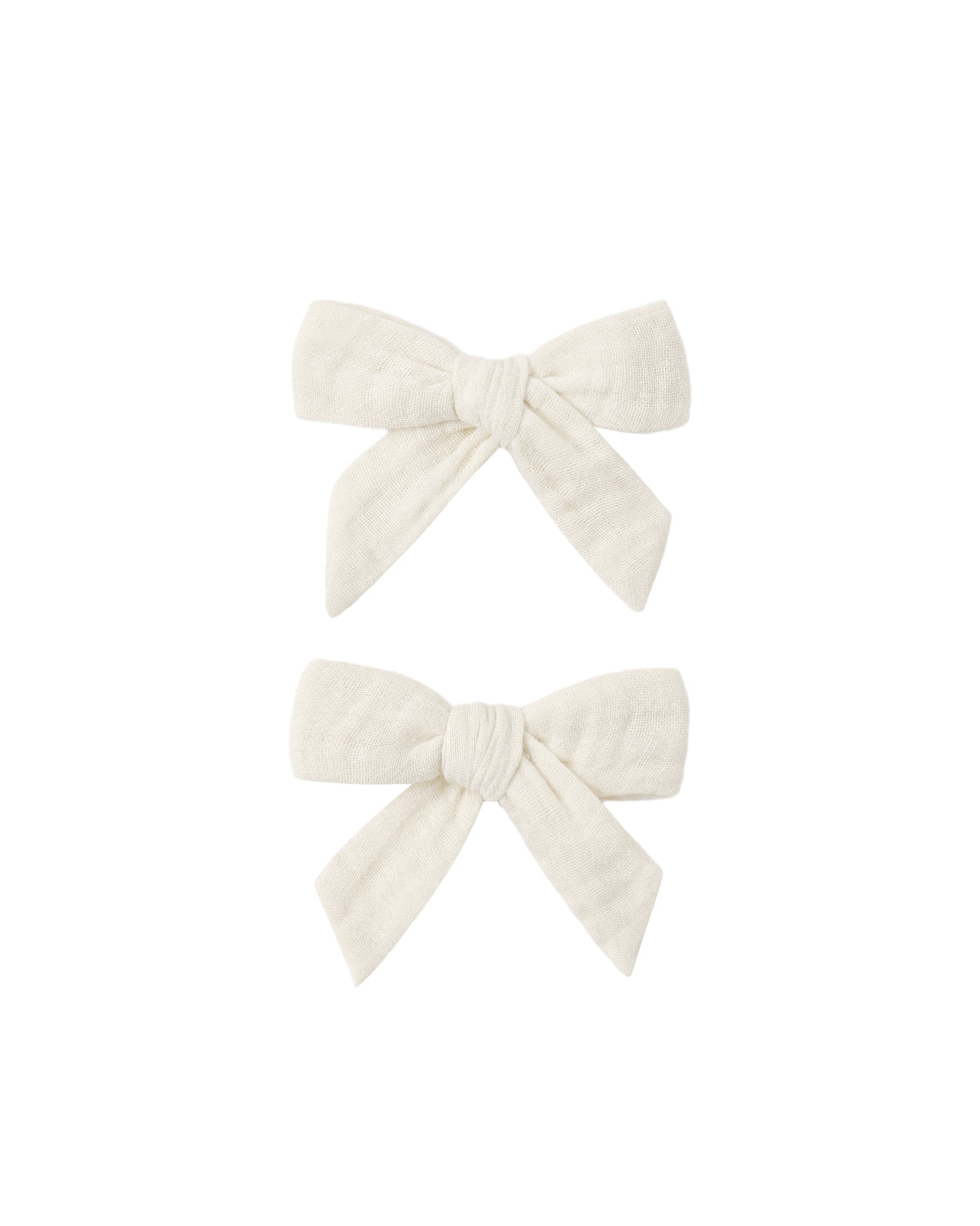 Set of 2 natural fabric bows from Rylee & Cru, soft and stylish accessories for babies or toddlers.