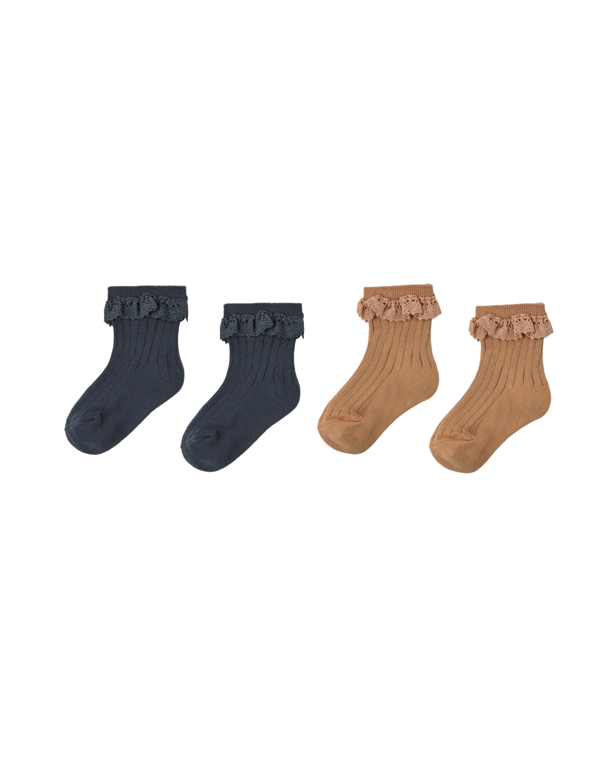 Pair of Rylee & Cru midnight lace trim socks in fawn color, featuring delicate lace detail, shown on a small child's feet.