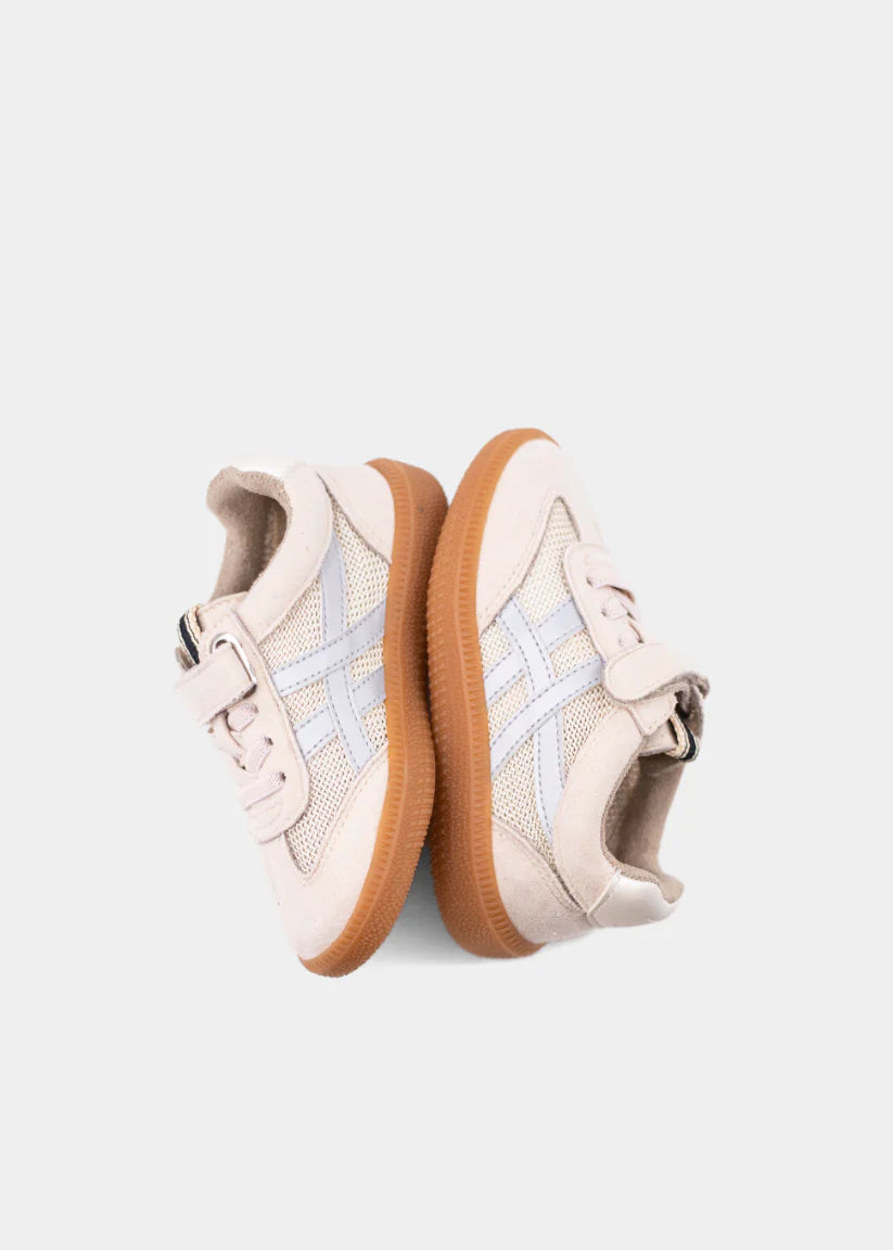 Beige Sasha Mini shoe by Shushop, showcasing a stylish mini footwear design with a sleek beige finish.