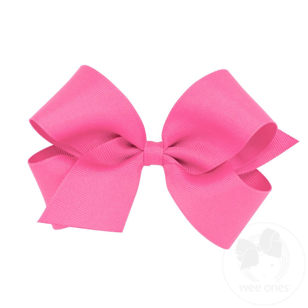 Medium classic grosgrain hair bow by Wee Ones, plain wrap style, shown in soft pink with a smooth grosgrain ribbon.