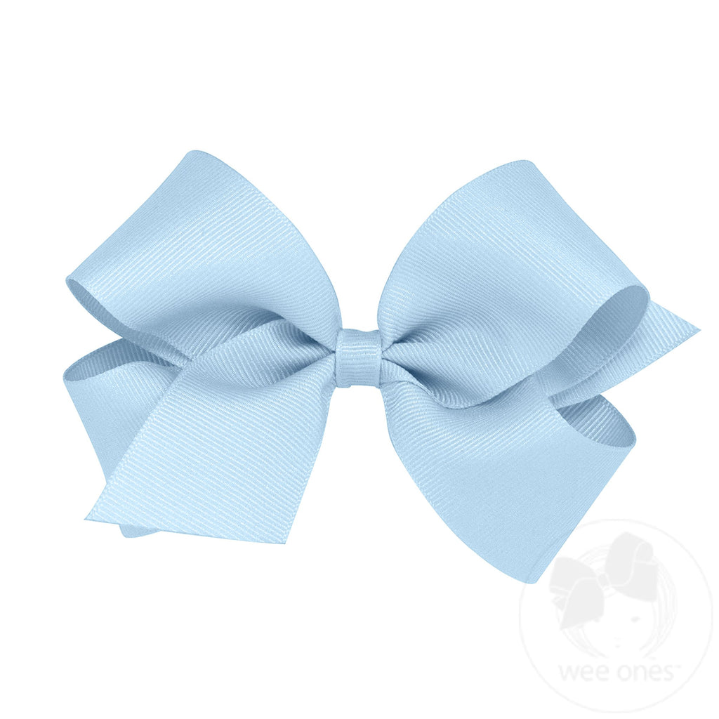 Medium classic grosgrain hair bow from Wee Ones, plain wrap style, shown in soft pink on a white background.