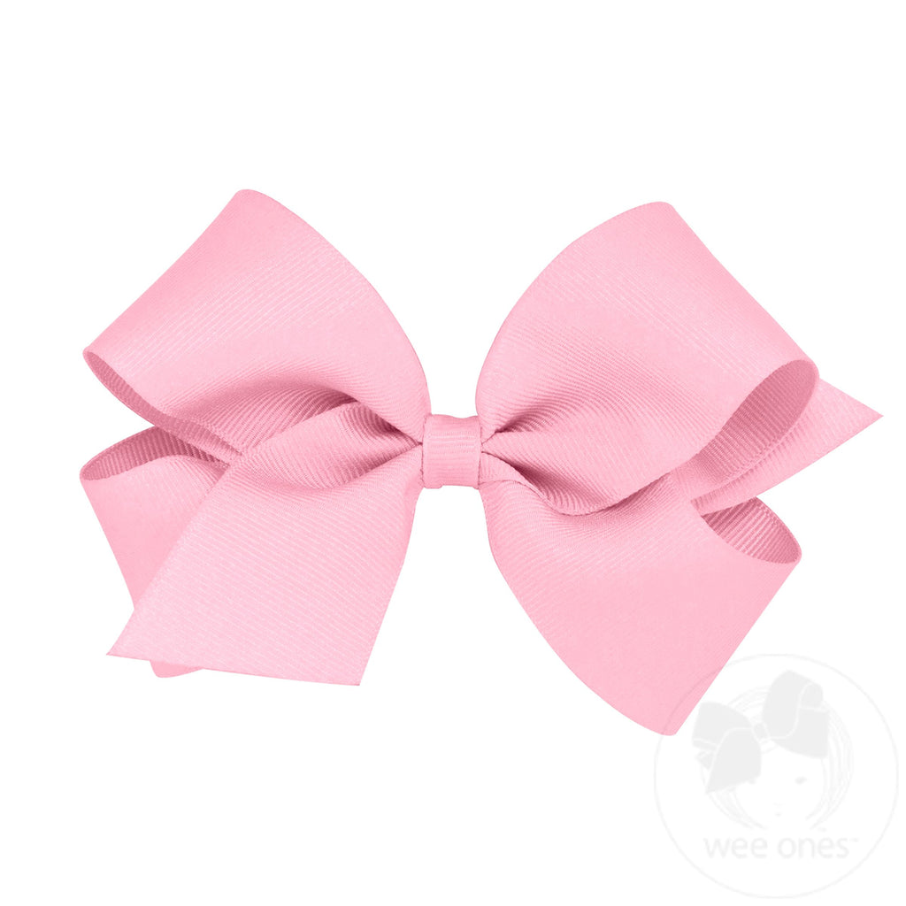 Medium classic grosgrain hair bow by Wee Ones with plain wrap, shown in a close-up view of the soft, textured fabric.