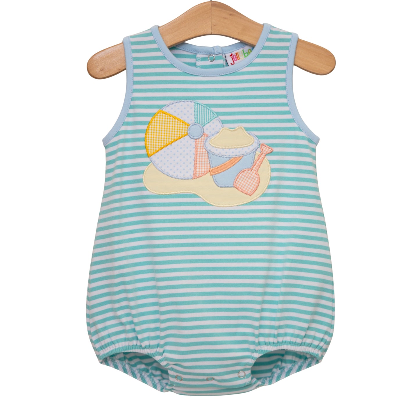 Jellybean Beach Days Bubble with colorful soap bubbles floating outdoors in sunny weather.