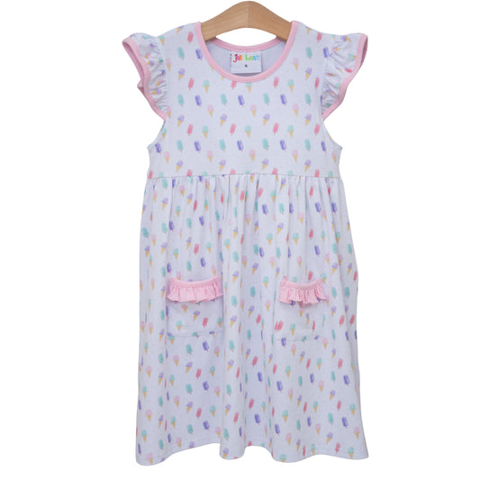 Jellybean Summertime Sweets Ruffle Pocket Dress in colorful fabric with ruffle details and pockets, perfect for warm weather.