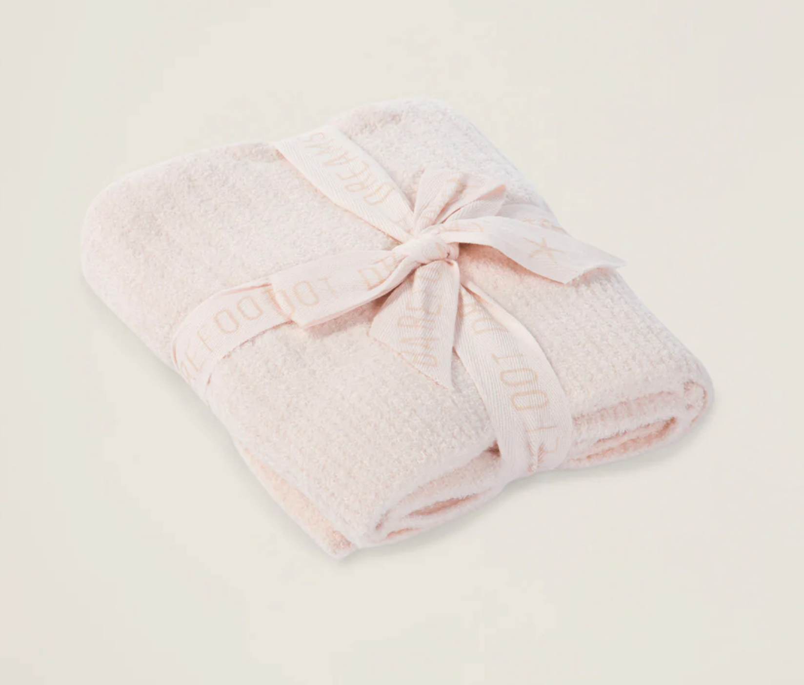 Barefoot Dreams Cozychic Lite ribbed pink baby blanket with soft, cozy fabric and gentle ribbed texture for infants.