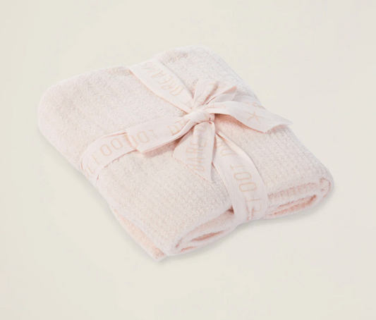 Barefoot Dreams Cozychic Lite ribbed pink baby blanket with soft, cozy fabric and gentle ribbed texture for infants.