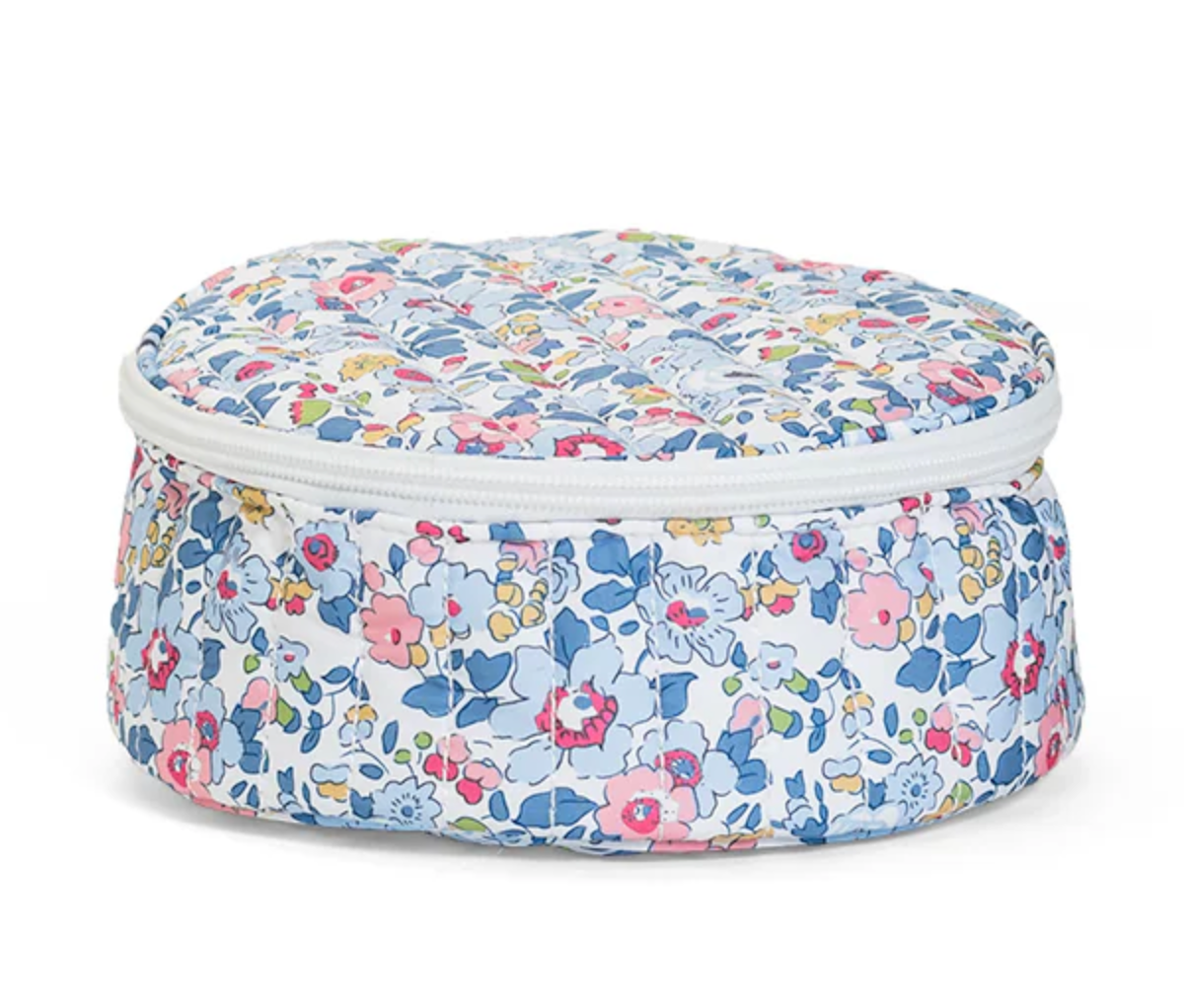 Round quilted jewelry box from TRVL Designs with a jewel-toned quilted pattern and a soft, padded exterior.