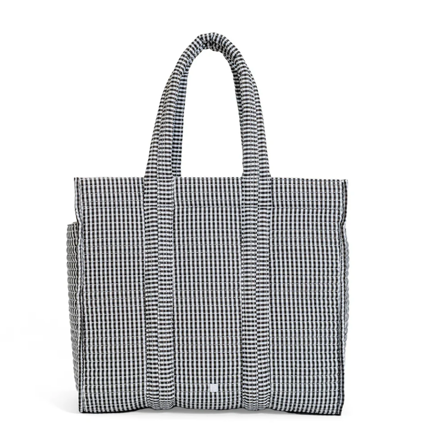 Black gingham Quilted Go Go Tote bag by TRVL Designs with quilted fabric and sturdy handles, suitable for daily use.