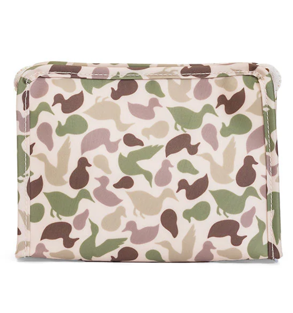 TRVL Design Roadie Medium Zip Pouch with black zipper and fabric exterior, shown in a close-up image.
