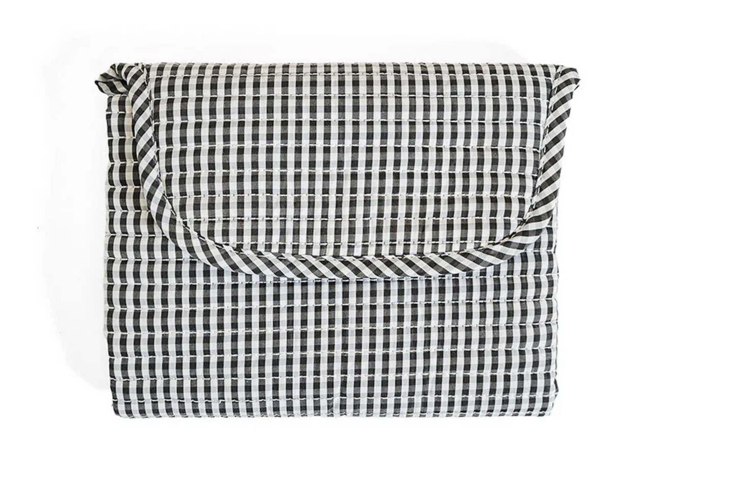TRVL Designs quilted changing mat with padded surface, ideal for comfortable diaper changes for babies.
