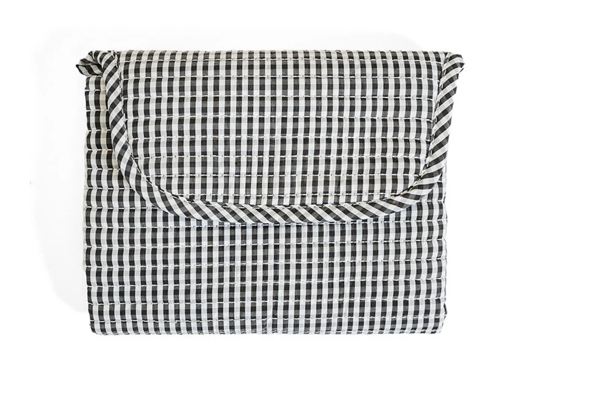 TRVL Designs quilted changing mat with padded surface, ideal for comfortable diaper changes for babies.