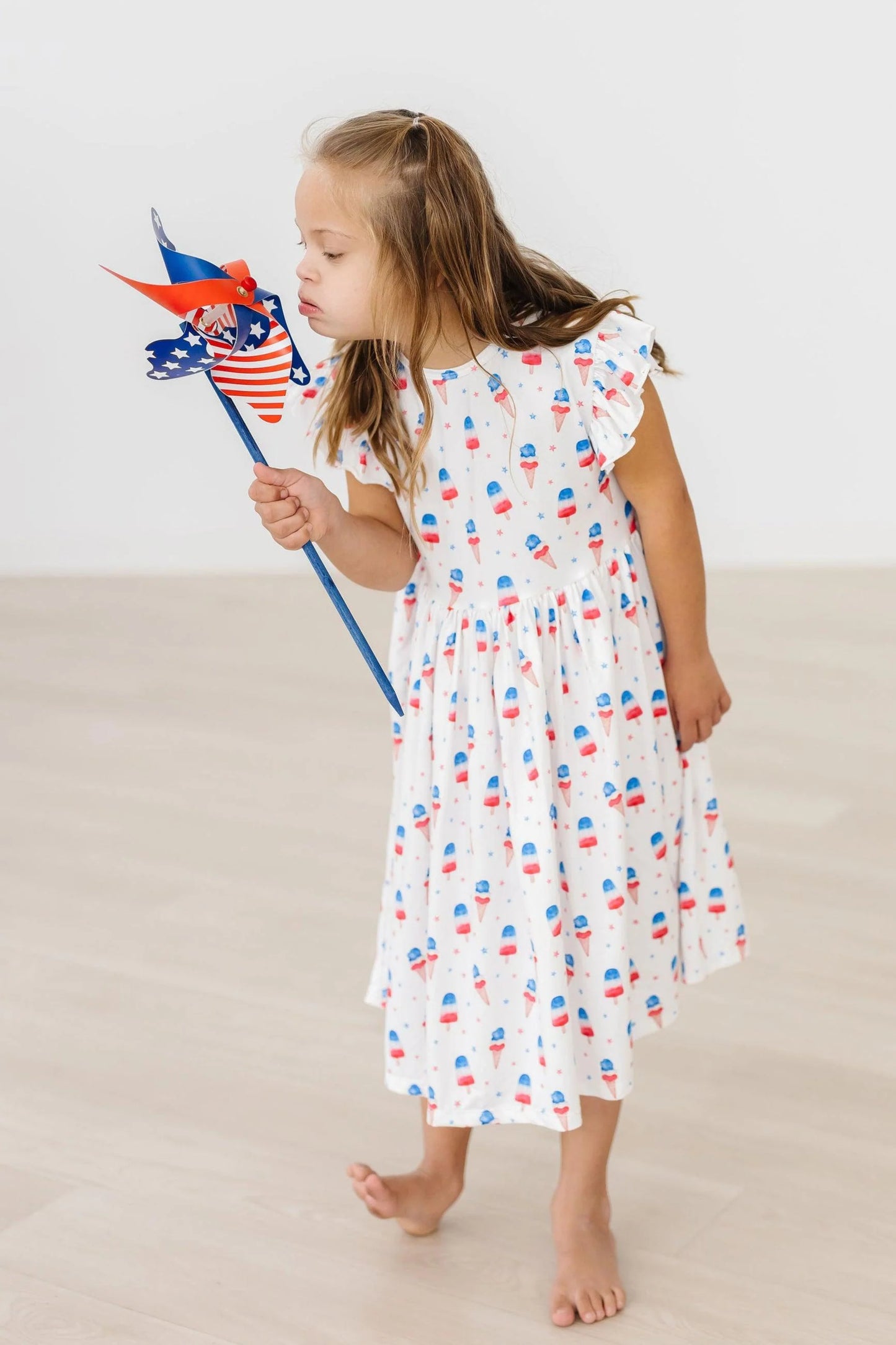 Pink Mila & Rose Summer Sweets flutter sleeve twirl dress with floral pattern, perfect for warm weather and playful summer days.
