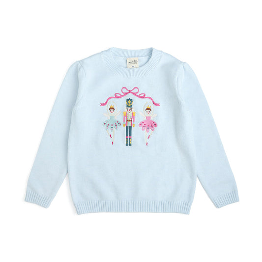 Red Christmas sweater with embroidered nutcracker design from Sweet Wink, featuring festive holiday embroidery.