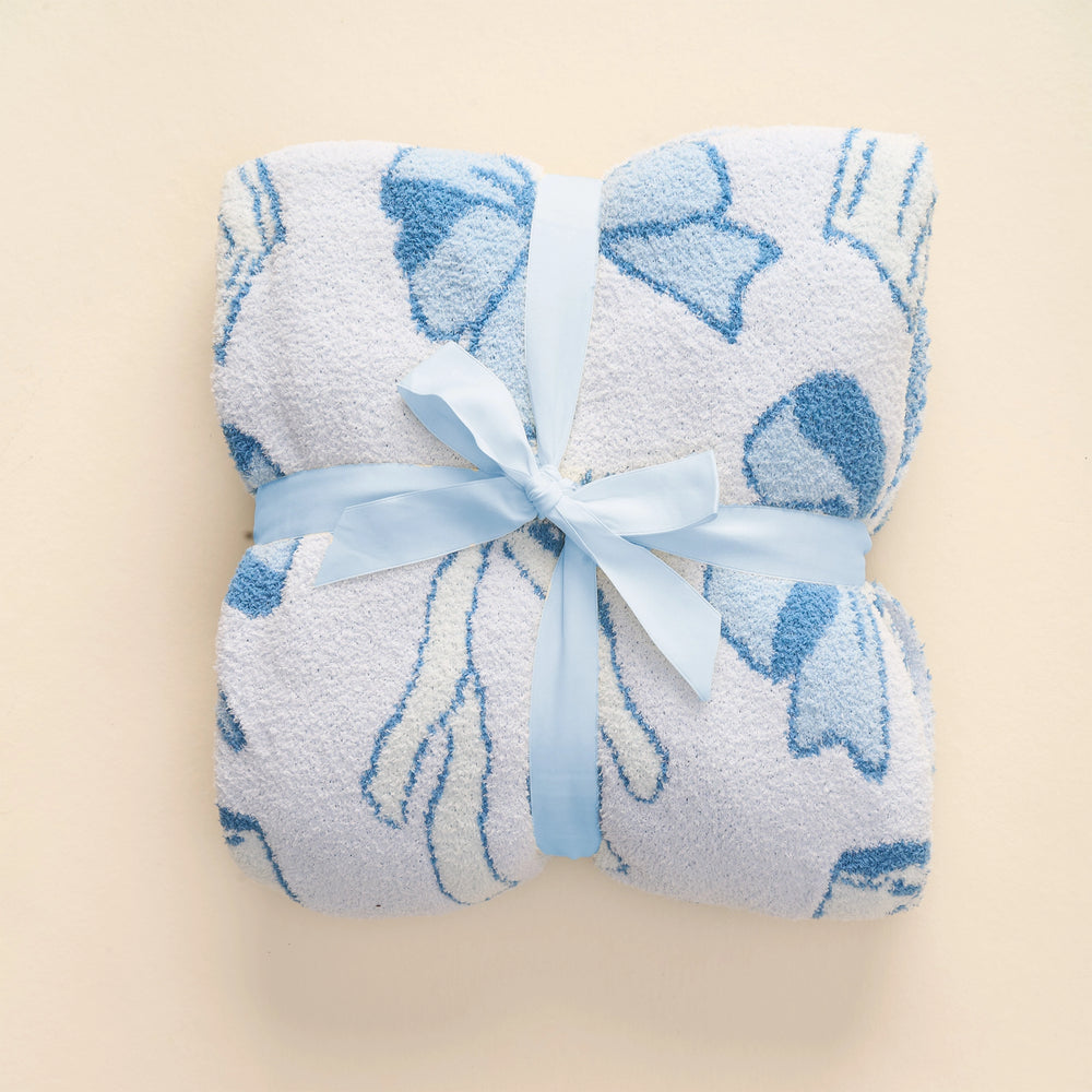 
            
                Load image into Gallery viewer, The Darling Effect - Cozy Dreams Luxe Blanket-Blushing Bows Blue
            
        