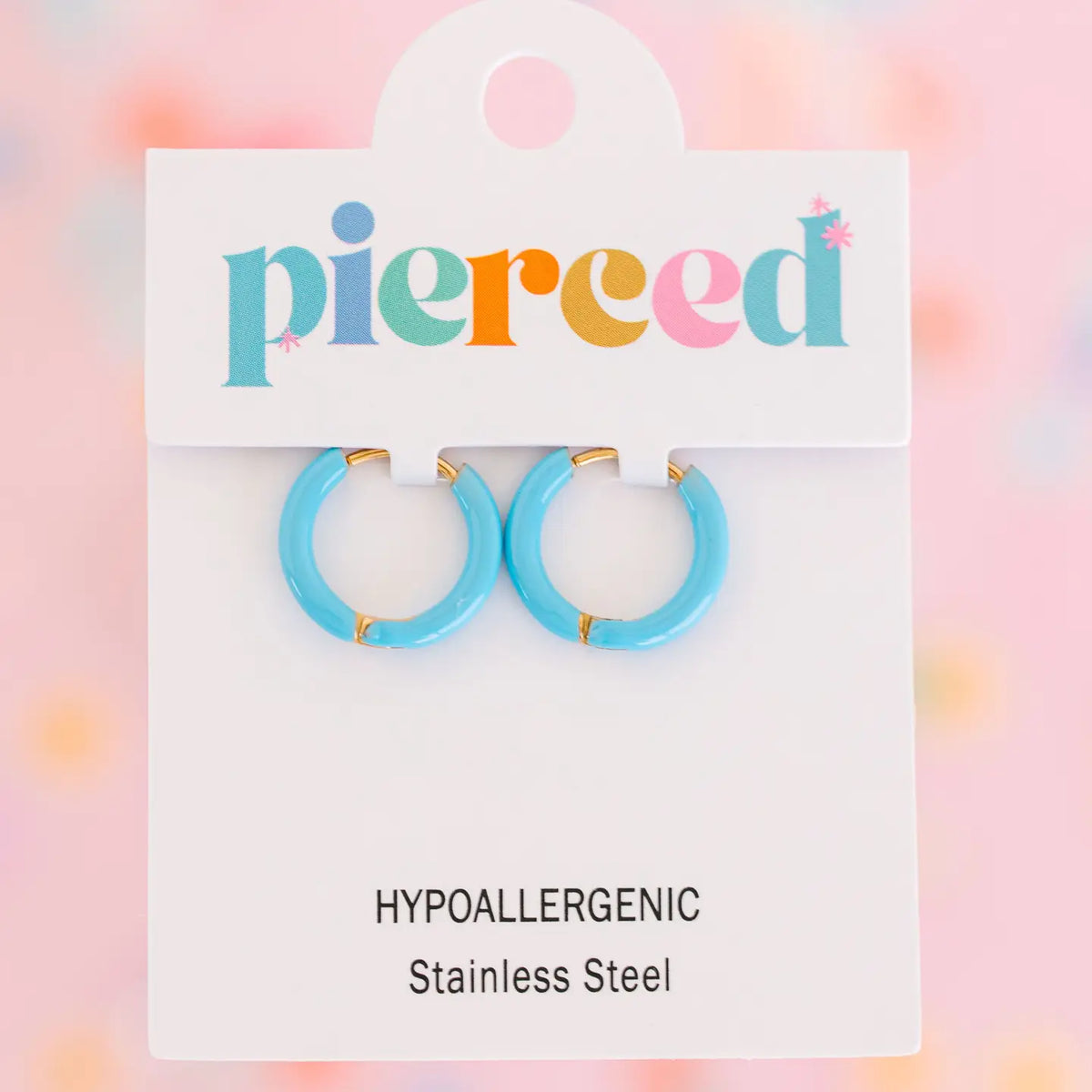 Pierced Co colored huggie earrings with vibrant, multicolored hoops for a stylish and trendy jewelry look