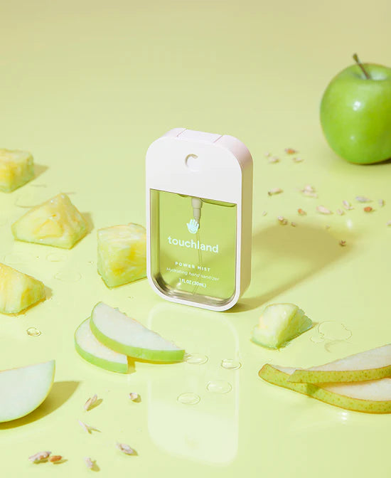 Touchland Powermists hand sanitizer with appleicious scent in a sleek, portable spray bottle.