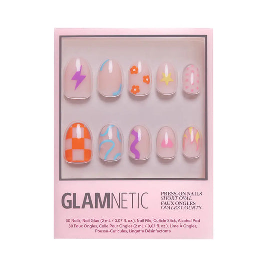 Short oval Wild Child press-on nails by Glamnetic in multicolor, showcasing vibrant, stylish nail designs on a natural hand.
