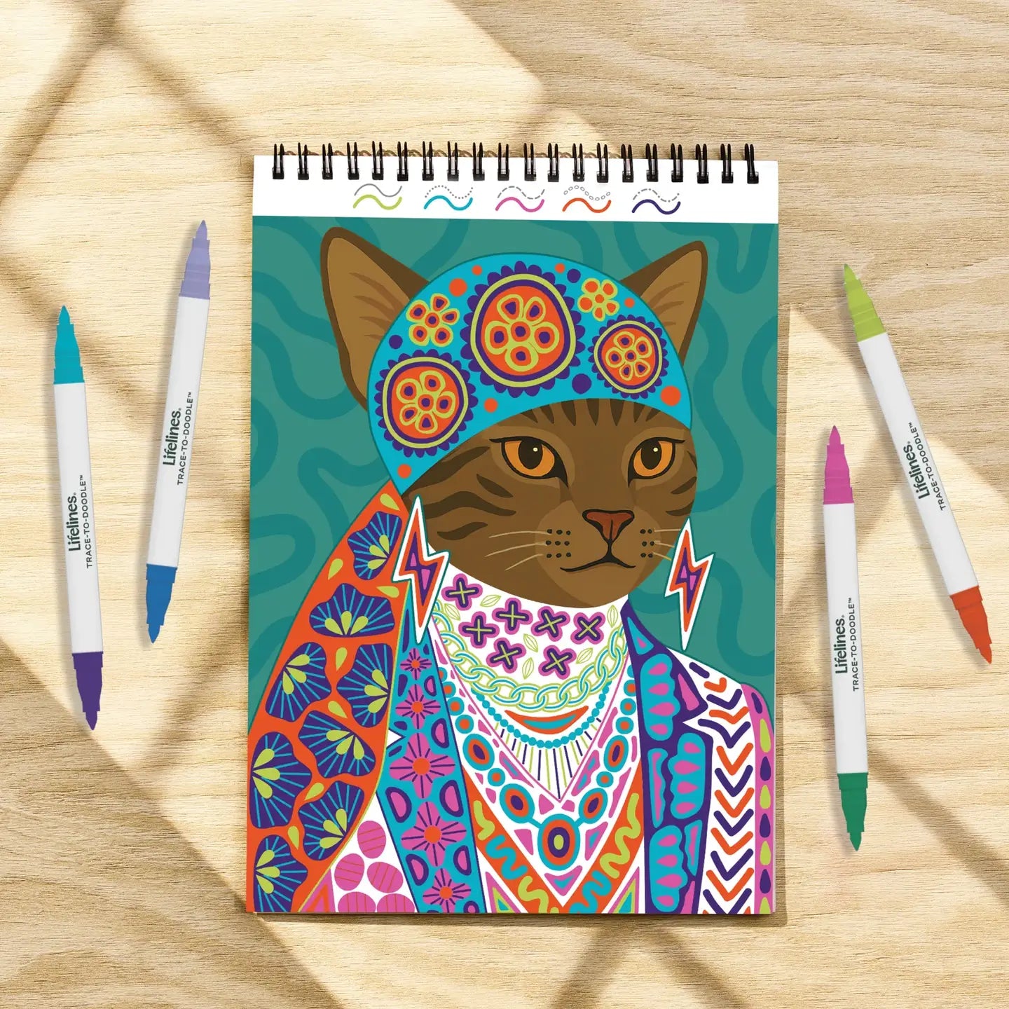 Flowart Trace To Doodle Wild Style by Lifelines features vibrant, abstract doodle artwork on a white background.