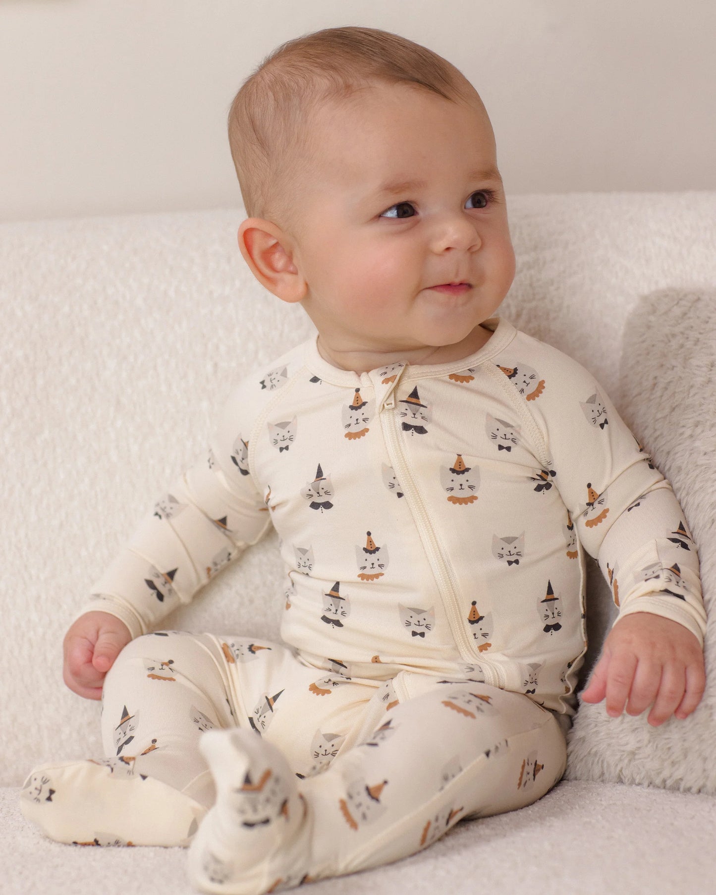 Quincy Mae kitten-themed bamboo zip footie costume for babies, featuring soft fabric and a cozy design with cute kitten details.